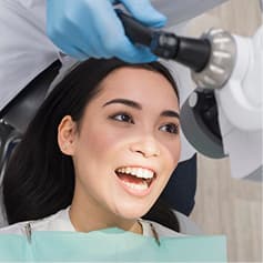 Dentist treating patient